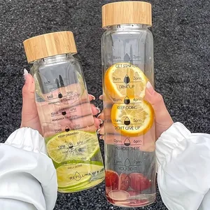 Botella de agua de vidrio de borosilicato de gran capacidad, transparente, 24oz, 34oz, marcador de tiempo, botella de leche para bebidas con tapa de Bambú - Product Image 6