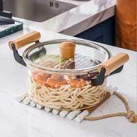 Vente en gros d'ustensiles de cuisine en verre écologiques, casserole en verre transparent avec couvercle en verre et poignée en bois