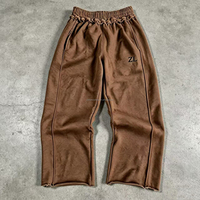 Pantalon de survêtement vintage en molleton 100% coton, délavé à l'acide, effet usé et déchiré, coupe large, avec logo ZL et ourlet effiloché, style streetwear