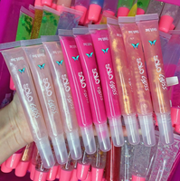 Lipgloss Dasar Label Pribadi Bening Kustom Mesin Gantungan Kunci Buah Roll Pada Tabung Buah Make Up Berkilau Vegan Grosir Lip Gloss