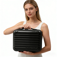 Accessoire de voyage pour les essentiels cosmétiques. Valise de maquillage portable élégante et légère avec fermeture éclair, coque rigide de 12 pouces, poignée souple