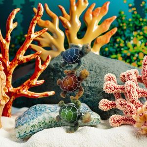Figurines spéciales de tortues marines dans une variété de couleurs, yeux grands et uniques, idéales pour les anniversaires - Product Image 1
