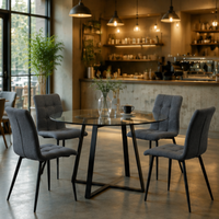 Ensemble de table à manger moderne de luxe avec chaises en tissu gris, structure en fer, plateau rond en verre écologique pour salle à manger et hôtellerie
