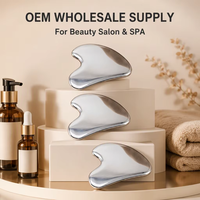 Outil de massage facial Gua Sha en acier inoxydable en forme de cœur, vente en gros d'usine