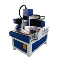 Routeur CNC 6090 de haute précision avec entraînement à vis à billes pour la sculpture sur bois des petites entreprises