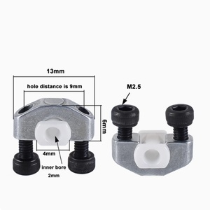 Guía de hilo para máquina de 200 hilos, ojal de cerámica de circonia mecanizado por CNC, pulido a espejo, asiento metálico con orificio interior de 2 mm, distancia de 9 mm - Product Image 1