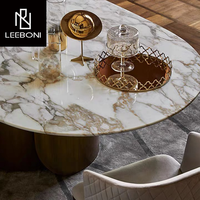 Table et chaise de salle à manger de luxe en acier inoxydable brossé et dessus en marbre artificiel 8 places