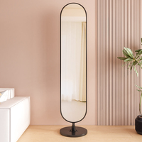 Miroir de dressing multifonctionnel rotatif moderne en métal pour chambre à coucher Miroir sur pied avec porte-manteau et porte-chapeau Miroir décoratif