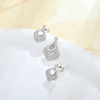 Ensemble de bijoux QX personnalisé en argent 925 avec CZ, fabrication OEM ODM, couleur plaquée, couleur de pierres précieuses, gravure laser gratuite, pendentif et boucles d'oreilles