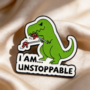 Insignia Esmaltada con un Dinosaurio Imparable - un Broche Divertido y Motivacional Estilo Anime, Perfecto para Mochilas y Bolsos - Product Image 1