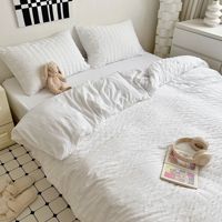 Ensemble de literie en gaze de mousse plissée de style minimaliste frais, quatre pièces