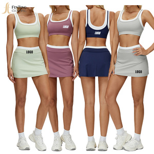 Ensemble de sport 2 pièces pour femme Under Lulu : <span class=keywords><strong>Jupe</strong></span>-<span class=keywords><strong>short</strong></span> de <span class=keywords><strong>tennis</strong></span> taille haute avec contrôle du ventre et <span class=keywords><strong>short</strong></span> de sport contrastant avec poches, offrant un soutien optimal - Product Image 1