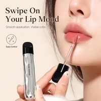 Gloss à lèvres naturel longue tenue effet léger et hydratant pour le maquillage quotidien, disponible en styles crème glacée et noir en stock