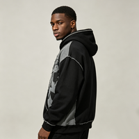 Sweat à capuche zippé noir délavé tie-dye avec broderie motif épines et bords effilochés, coupe ample, style gothique hip-hop