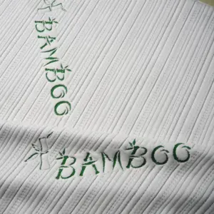 Kain Tekstil Desainer Pelapis Ramah Kulit Serat Bambu Rajutan Jacquard Matras Mencentang
