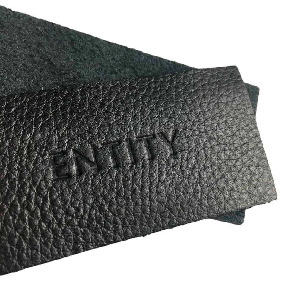 Fábrica personalizado grabado el nombre de la marca de moda falso negro cuero parche para ieans