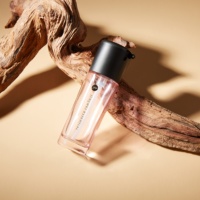 Bouteilles de sérum de luxe en rose givré de 40ml pour le visage, huile essentielle, bouteille ronde en verre cosmétique avec bouchon noir