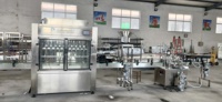 Ensemble complet de ligne de production d'eau potable pure en bouteille plastique entièrement automatique et machine de remplissage d'eau en provenance de Chine.