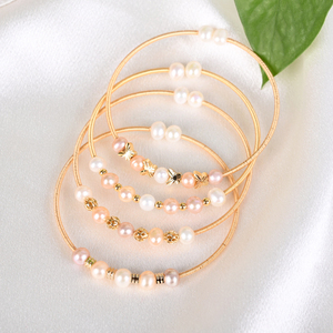 กำไลข้อมือแฟชั่นลดราคาสุดฮอต ประดับมุกธรรมชาติพันด้วยลวดทอง - Product Image 2