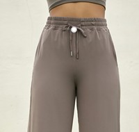 Jeunes femmes minceur lâche cordon Yoga jambe droite pantalon avec poche femmes fendu sport Yoga pantalon mince Fitness pantalon