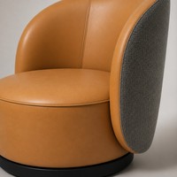 Fauteuil de salon moderne en cuir avec accoudoirs, idéal pour les hôtels, salles d'attente et chambres.