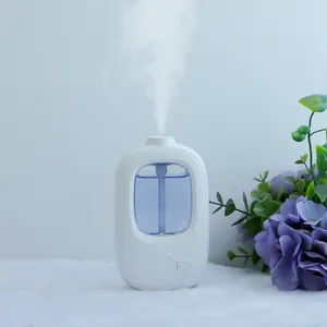 Intelligent aromatherapy machine essential oil dispenser a variety of fragrances can be hung on the wall