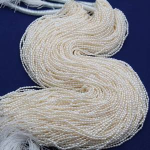 Perles d'eau douce naturelles cultivées en gros, petites perles en forme de riz de 2-3 mm, perles en vrac pour le bricolage, provenant directement des fabricants - Product Image 1