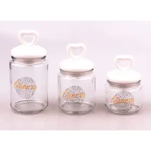 Chất lượng tốt nhất Vòng kẹo thủy tinh lưu trữ Canister Jar container thực phẩm với hình trái tim Nắp gốm và decal cho trang trí nội thất