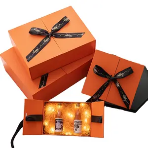 Caja de embalaje de regalo de color naranja para niños frente a abrir la caja de regalo celebridad web creativa caja abierta Doble