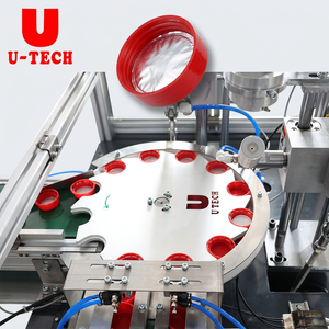 Máquina Automática para Insertar Tapas Abatibles de Plástico, Juntas de Aluminio y Arandelas de Espuma, y Plegar Tapas - Product Image 1