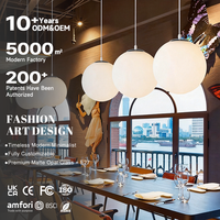 Lampe suspendue LED minimaliste ronde en verre clair et fer, à lueur douce, pour chambre à coucher, hôtel, lumineuse, durable et efficace