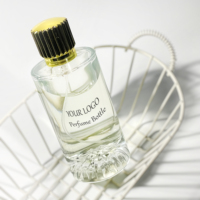Bouteille d'huile essentielle d'atomiseur de cylindre rond Transparent bouteille de parfum vide 100ml bouteille de parfum de jet d'emballage en verre