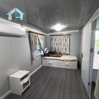 Maison conteneur préfabriquée portable de 20 pieds, respirante et épaissie, extensible et pliable, style villa moderne, avec salon modulaire