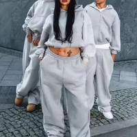 Ensemble de survêtement tricoté pour homme, coupe décontractée, avec logo personnalisé sur le devant, comprenant un sweat à capuche zippé et un pantalon de jogging, service OEM