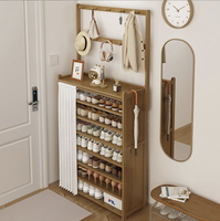 Meuble de rangement mural multi-niveaux avec porte-chaussures intégré, élégant support pour chapeaux et vêtements, et armoire à chaussures pour entrée