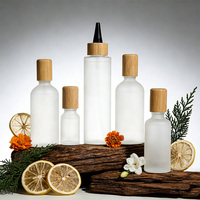 Bouteilles compressibles en verre dépoli personnalisées en gros avec bouchon en bambou, pots vides anti-fuite pour huile capillaire, sérum pour le cuir chevelu et produits de soin de la peau