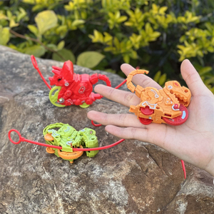 Vente en gros <span class=keywords><strong>Lanceur</strong></span> drôle en forme de dinosaure pour garçon Toupies à tirer Jouet gyroscopique à tirer - Product Image 3
