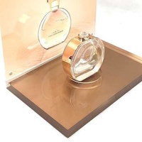 Porte-bouteilles de parfum cosmétique en acrylique de luxe Présentoir de point de vente de grand magasin de beauté en or rose avec affiche modifiable