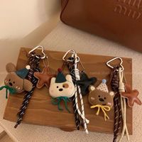 Porte-clés mignon en peluche chien-ours avec chapeau de fête, pendentif breloque de sac étoile en corde tressée style coréen pour décoration de sac femme, cadeau
