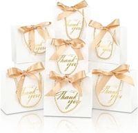 Cosmétique de luxe personnalisé shopping merci sac en papier emballage Saint Valentin feuille d'or Logo sac cadeau avec poignée et ruban