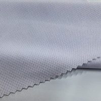 Tissu en maille respirante à œillets 75D 160GSM 100% polyester pour vêtements, maillots de basketball, t-shirts - Vente en gros