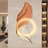 Horloge d'art murale en plumes personnalisée de haute qualité Éclairage LED Décoration murale en céramique de chambre à coucher