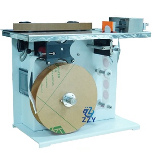 Machine d'étiquetage d'angle de boîte semi-automatique de grande taille 75 mm pour la fermeture de cartons à angle droit et les autocollants VOID anti-effraction - Product Image 1