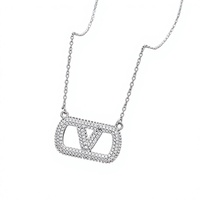 Nouveauté, bijoux de luxe en acier inoxydable entièrement sertis de diamants, marques de créateurs célèbres, collier et boucles d'oreilles en forme de lettre V pour femmes