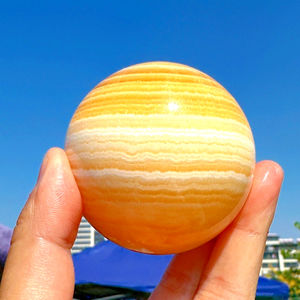 Sphère de cristal jaune de 6,5 à 7 cm en gros, pierres de guérison réelles, pierres précieuses, sphère de calcite jaune miel - Product Image 1