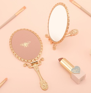 Miroir cosmétique portable pliable à double face, style baroque doré, avec support, miroir de table ovale HD en verre simple, vente en gros - Product Image 1