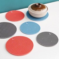 Sous-plat rond en silicone résistant à la chaleur et imperméable, texture nid d'abeille, antiadhésif, protection de table avec trou de suspension pour ustensiles de cuisine