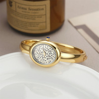 Montre-bracelet de luxe pour femme avec cadran léopard, montre à quartz ovale dorée de haute qualité pour femme, design de niche, vente en gros