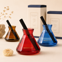 Diffuseur de parfum en verre coloré en gros avec bâtonnets noirs pour hôtels, spas et présentations de cadeaux