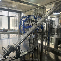 Machine de bouchage de remplissage de poche à bec rotatif automatique Machine de bouchage de remplissage de sac à buse Machine de remplissage de poche à bec